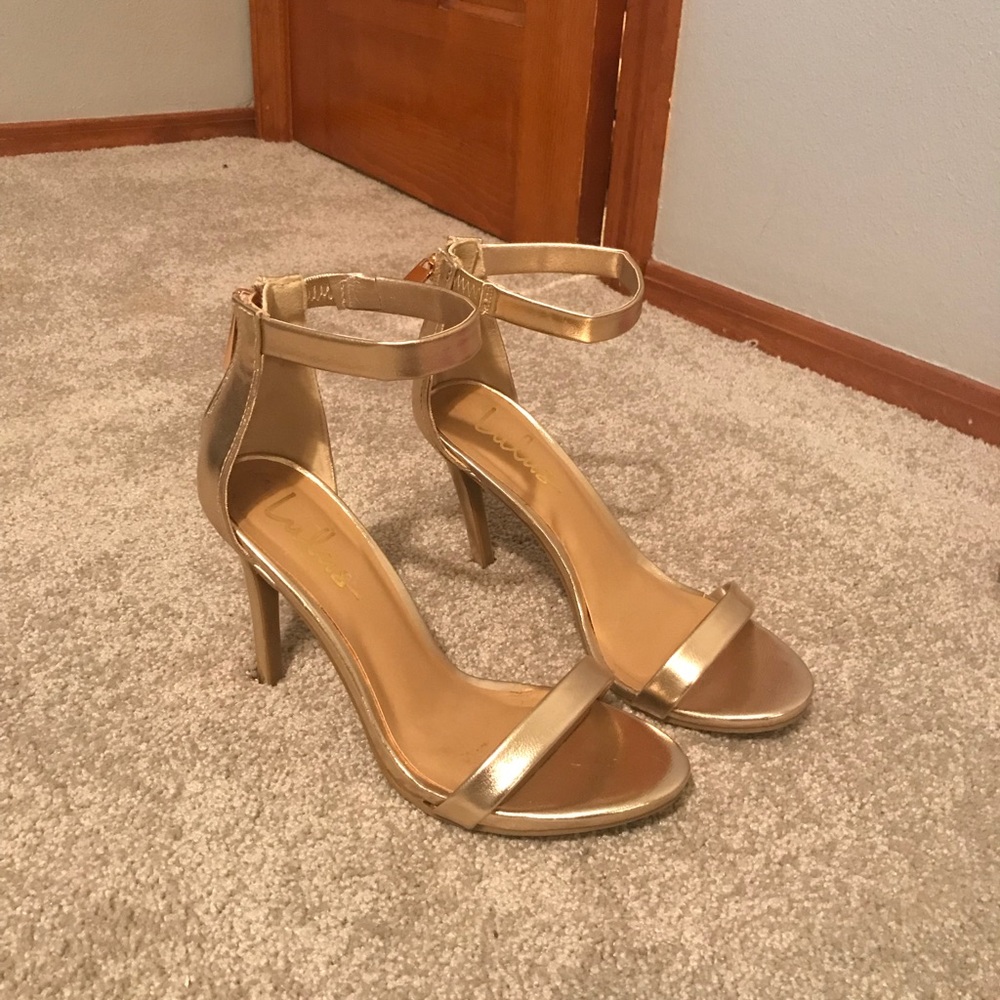 Gold high heels